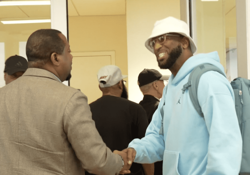 Rickey Smiley Shaking Hands
